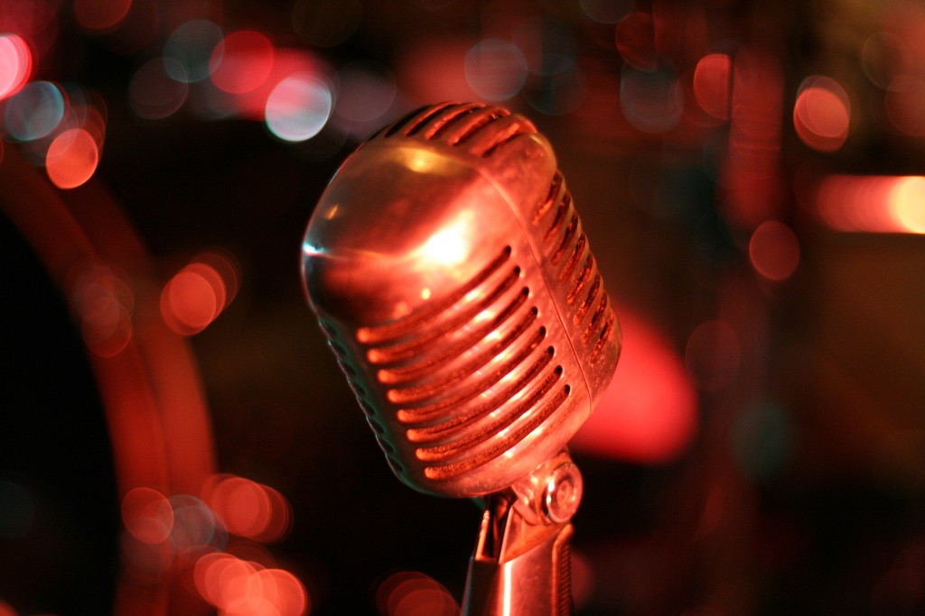Photo of a microphone with red lighting