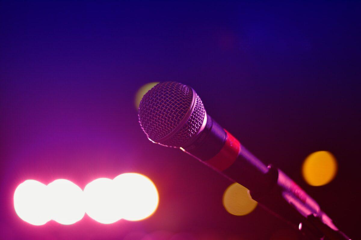 Microphone with purple background and lights