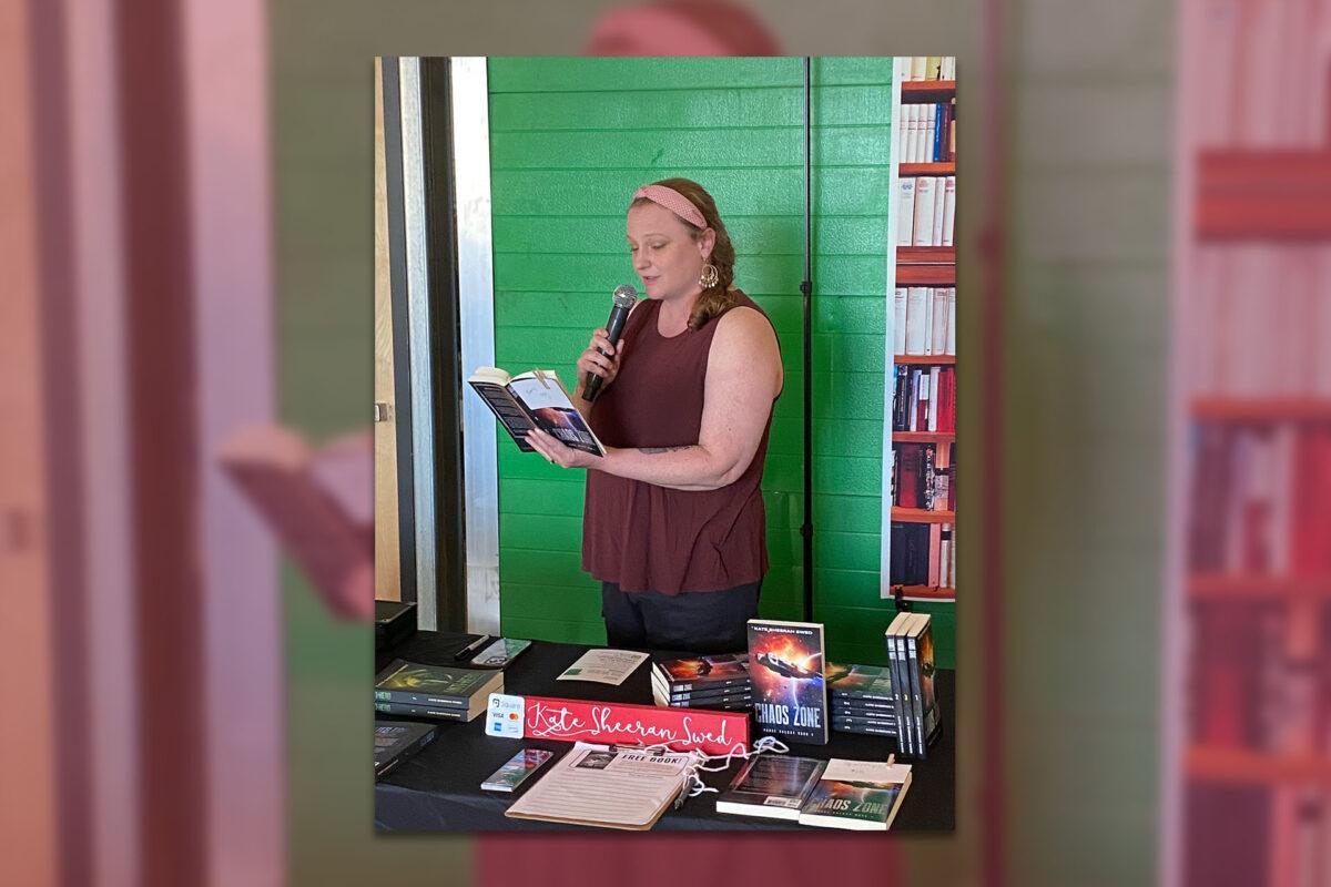 Photo of writer Kate Sheeran Swed reading from a book