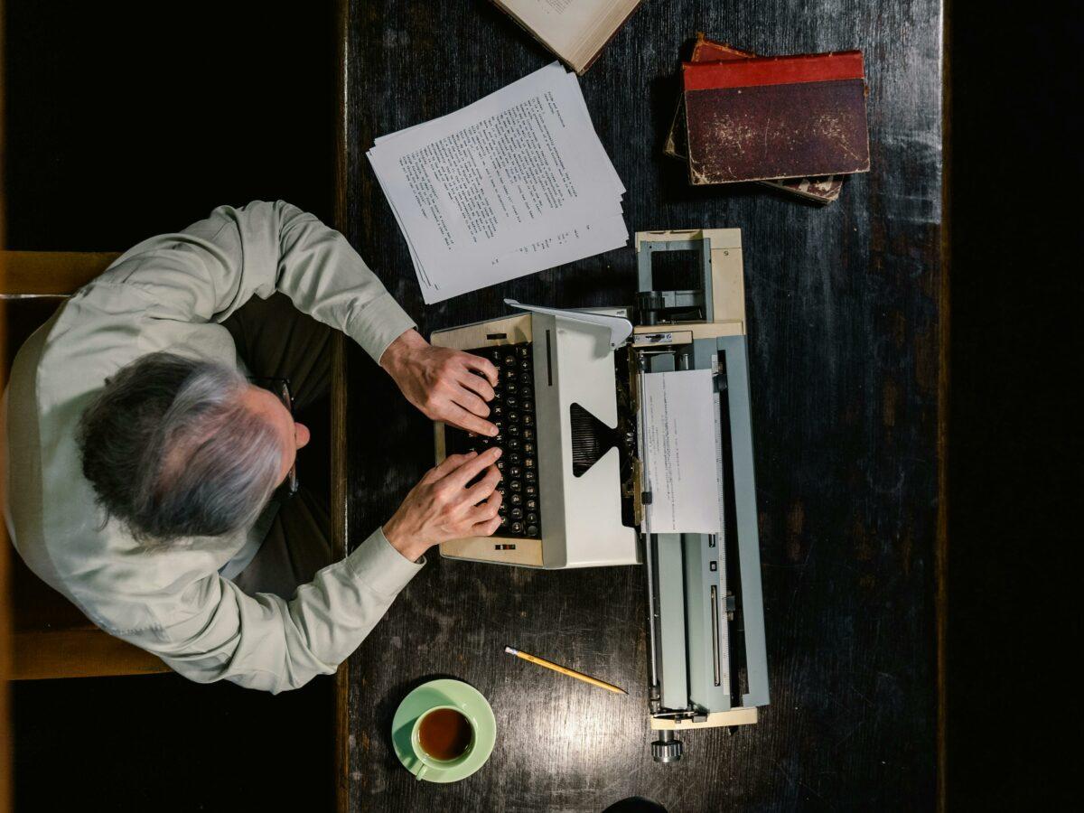 A Man using a Typewriter