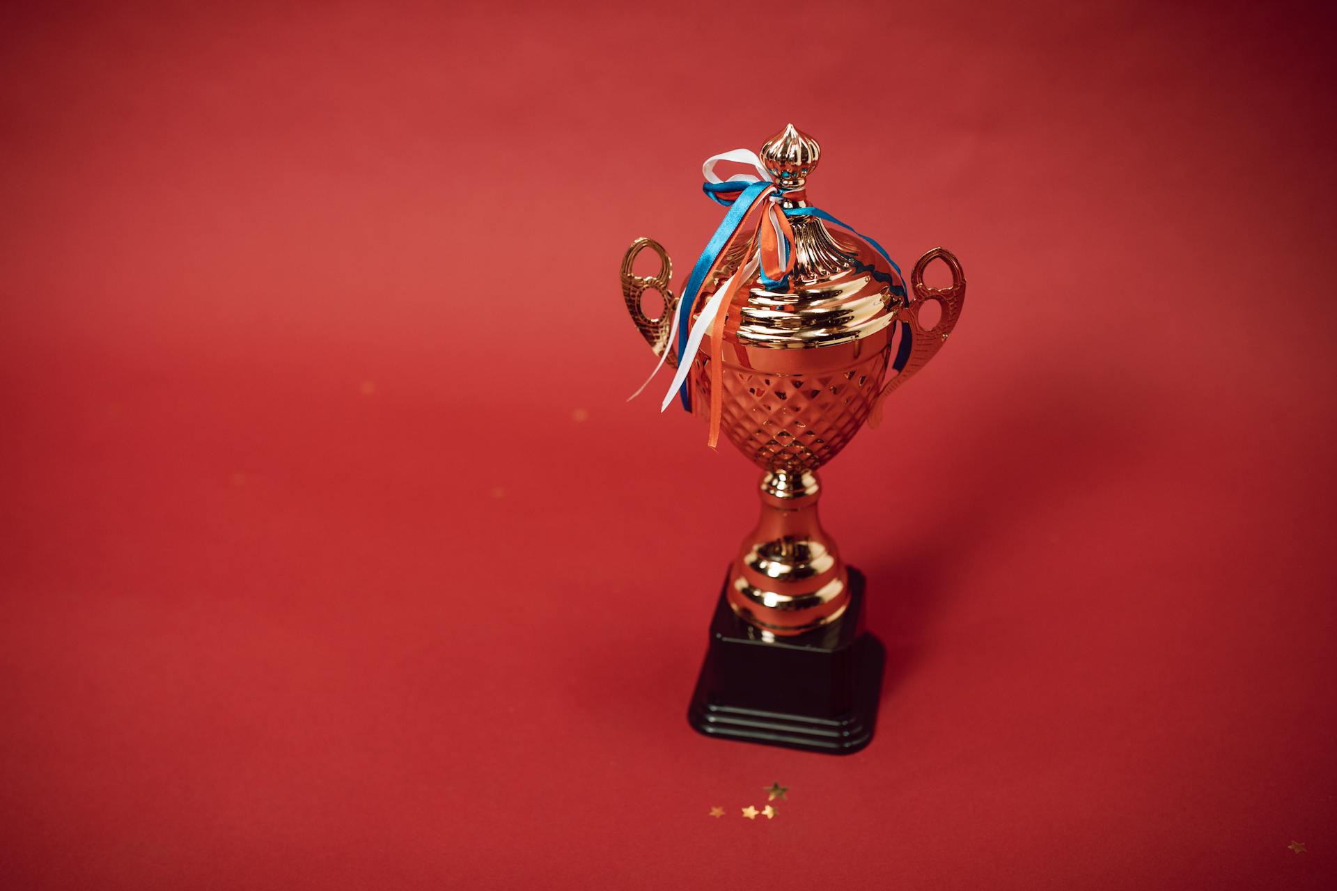 Throphy on red background